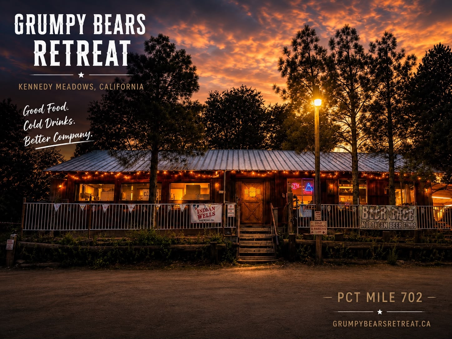 Grumpy Bear's Retreat at dusk — the lodge lit up under the pines at Kennedy Meadows, California, PCT mile 702